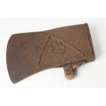 An antique cast iron axe head with Masonic motif