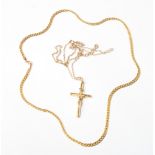A 9ct gold crucifix on fine link chain, 3.1g, and an Italian 14ct gold flat link necklace, 6.5g