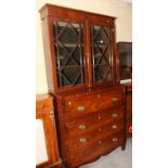 A George III mahogany bureau bookcase, the upper section enclosed astragal beaded glazed doors, base