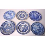 An early 19th Century blue and white dish decorated fishing scene, impressed crown to reverse, and a