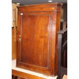 A 19th Century oak wall mounted corner cupboard, 34" wide