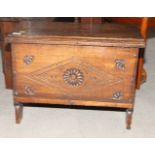 A pair of 17th Century design oak blanket boxes, fronts carved central rosette and lozenge, 24"
