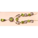 An Edwardian gold, diamond and peridot necklace