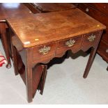 An 18th Century mahogany low boy, fitted three frieze drawers, on square chamfered supports, 33"