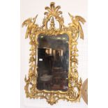 A Chippendale style wall mirror with gilt chinoiserie frame decorated phoenix and pagoda, 45" high