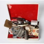 A jewellery box containing costume jewellery, coins, wristwatches, etc