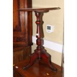 A Victorian walnut wine table, on turned column and tripod splay supports, 18" dia