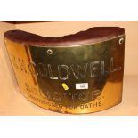 A curved brass nameplate engraved "H H Coldwell Solicitors", 17" wide