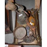 A copper coal scuttle, a pair of bellows, a kettle stand and other items of metal ware