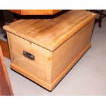 A waxed pine blanket box with candle compartment, on turned supports, 36" wide