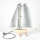 A "Bunting" electric room heater sailing boat, 31" high (for ornamental use only)