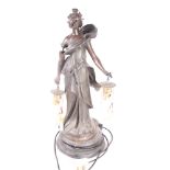 An Art Nouveau style spelter lamp in the form of a young maiden on ebonised plinth, 23" high (a/f)