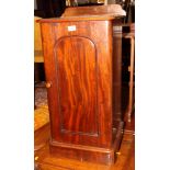 A 19th Century mahogany pedestal bedside cabinet enclosed arch panel door, 15" wide