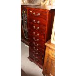 A polished as mahogany chest of ten drawers, 18" wide