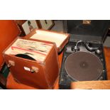 An HMV portable gramophone, in black case, and a number of 78rpm records, in case