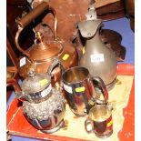 A copper kettle, a pewter hot water jug, an EPBM water jug, a plated milk jug and a plated tankard