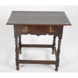 An early 18th Century oak side table, fitted one drawer, on turned and stretchered supports, 31"