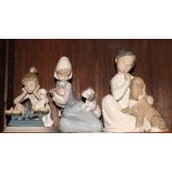 Three Lladro figures of children with cats and dogs