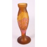 A Galle table lamp base with acid etched decoration of a landscape with trees, brown shading to