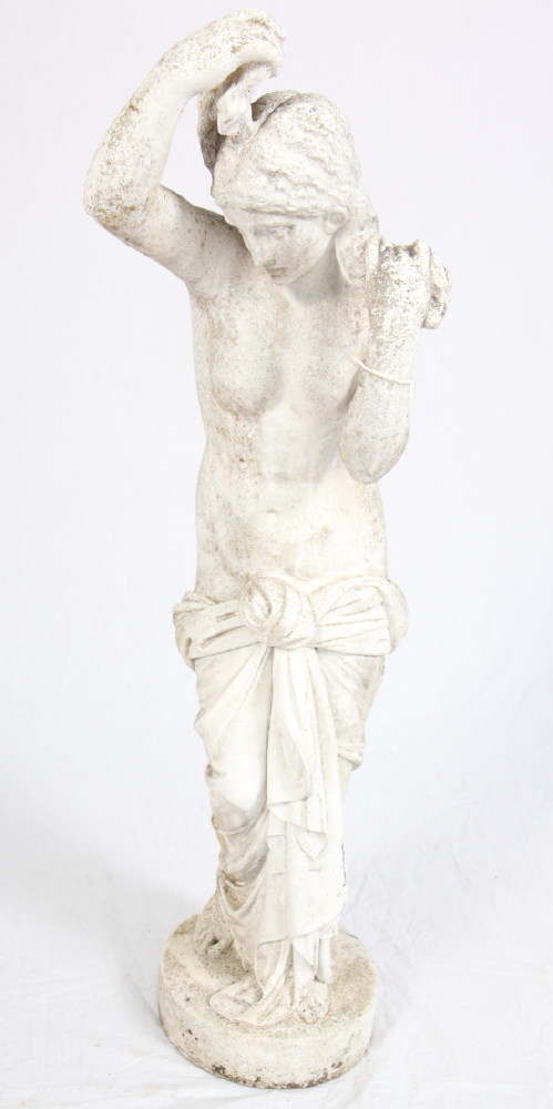 A carved marble figure of a classical woman adjusting her hair, inscribed Papinea, 34" high