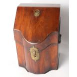 A George III mahogany cutlery box with sloping lid and serpentine front (fittings removed)