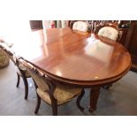 A late 19th Century mahogany circular extending dining table, on turned supports, 48" dia