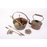 A copper kettle, a brass preserve pan, a brass ladle and other items of metal ware