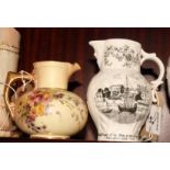 A Royal Worcester squat bulbous jug decorated flowers and a Royal Worcester jug commemorating the