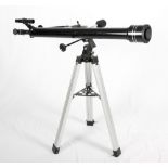 A Helios 60/900 refractor telescope, two lenses, moon filter, star angle and tripod