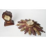 An Edwardian inlaid mahogany clock case and a red and gilt sunburst clock case, both fitted quartz