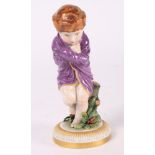 A 19th Century Russian porcelain figure emblematic of Winter, 5" high