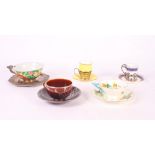 A Staffordshire brown glazed teacup and saucer with silver mounts and two bone china coffee cups and