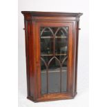 A Georgian mahogany corner display cabinet enclosed Gothic lattice glazed door, 27" wide