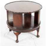 A walnut pie crust top library table, 25" dia