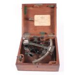 A brass sextant by Henry Hughes & Sons, in fitted mahogany case