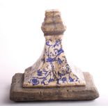 A 19th Century French ceramic wall bracket decorated in blue and white