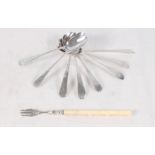 Eight various silver teaspoons with bright cut decoration and an ivory handled pickle fork