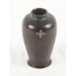 A 19th Century Japanese bronze oviform vase with inlaid silver flower and inscribed verse, 4 1/2"