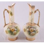 Two green pearline glass vases and a pair of Crown Devon ewers decorated flowers (both restored)