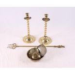 Two late 19th Century Middle Eastern brass, silver and copper inlaid shallow bowls, a toasting fork,