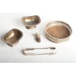 A pair of plated on copper salts, a pierced bottle coaster, a pair of tongs and a sterling mounted