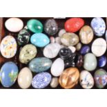 A collection of polished hardstone, cloisonné and other decorative eggs, various