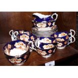 A late 19th Century Imari decorated bone china part teaset