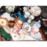 A floral decorated ceramic wig stand, base inscribed "Christian Dior", and other items of decorative