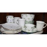 A Shelley part teaset decorated shamrocks and a Shelley white china part teaset