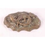 A 19th Century gilt brass desk weight formed as a lizard on floral outcrop, 3 3/4" wide