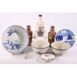 A limited edition Amundsen commemorative plate, three Wheelers of Wycombe stoneware bottles and