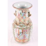 A 19th Century Canton porcelain vase decorated in famille verte enamels with panels of figures and