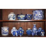 Eight blue and white ginger jars, five blue and white vases, a teapot and other blue and white