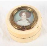 A 19th Century turned ivory and gilt metal mounted box with inset portrait miniature, 2 1/2" dia